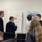 missionaries signing the Carter memorial door