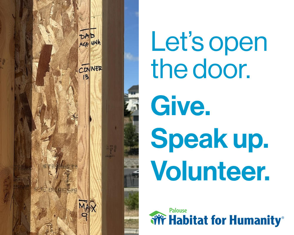 A detailed view of a wooden home framing stud marked with children's names, highlighting Palouse Habitat volunteer opportunities.